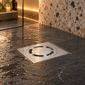 Rejilla de piso con diseño circular ambientada en ducha
