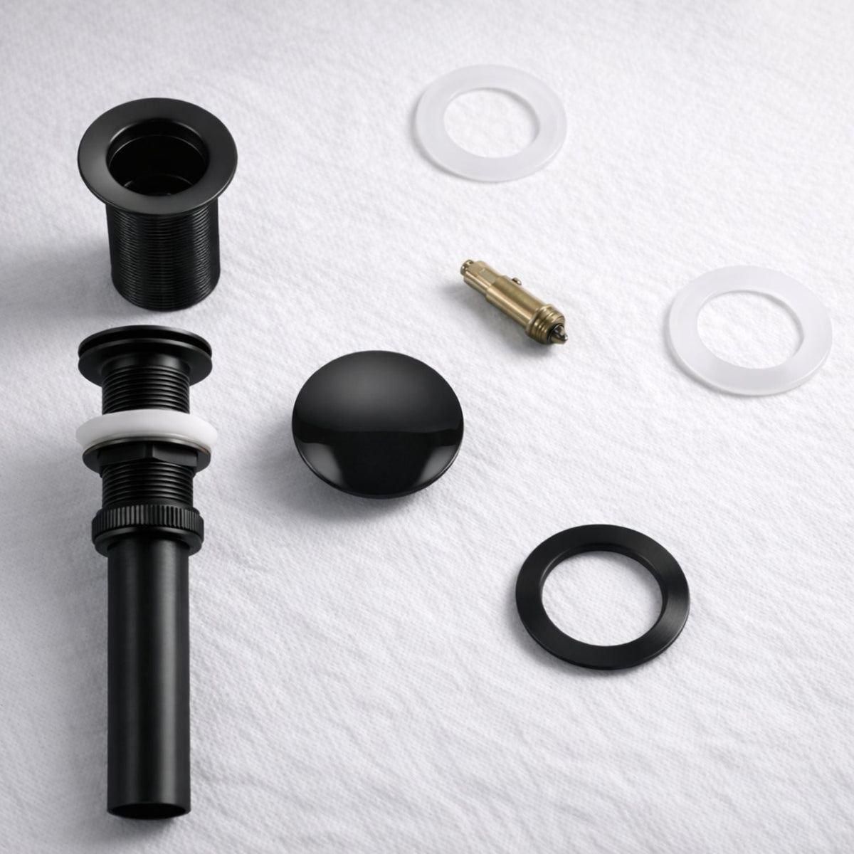 Desagüe Push para Lavamanos Negro Mate 7,8 cm de alto y 6,6 cm de ancho