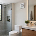 Extractor de aire MINI STYLE TIMER 4 pulgadas instalado en baño moderno