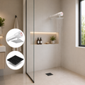 Combo ducha eléctrica Lusso blanca 110V y rejilla negra mate instalado en baño moderno