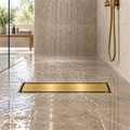 Rejilla invisible Oro cepillado instalada en ducha
