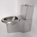 Sanitario monolítico antivandálico de acero inoxidable satinado, fotografía original con taza, tanque y faldón.
