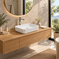 Lavamanos Stella blanco instalado: vista amplia del baño. Grifería, desagüe, cubierta, mueble y decoración no incluidos.